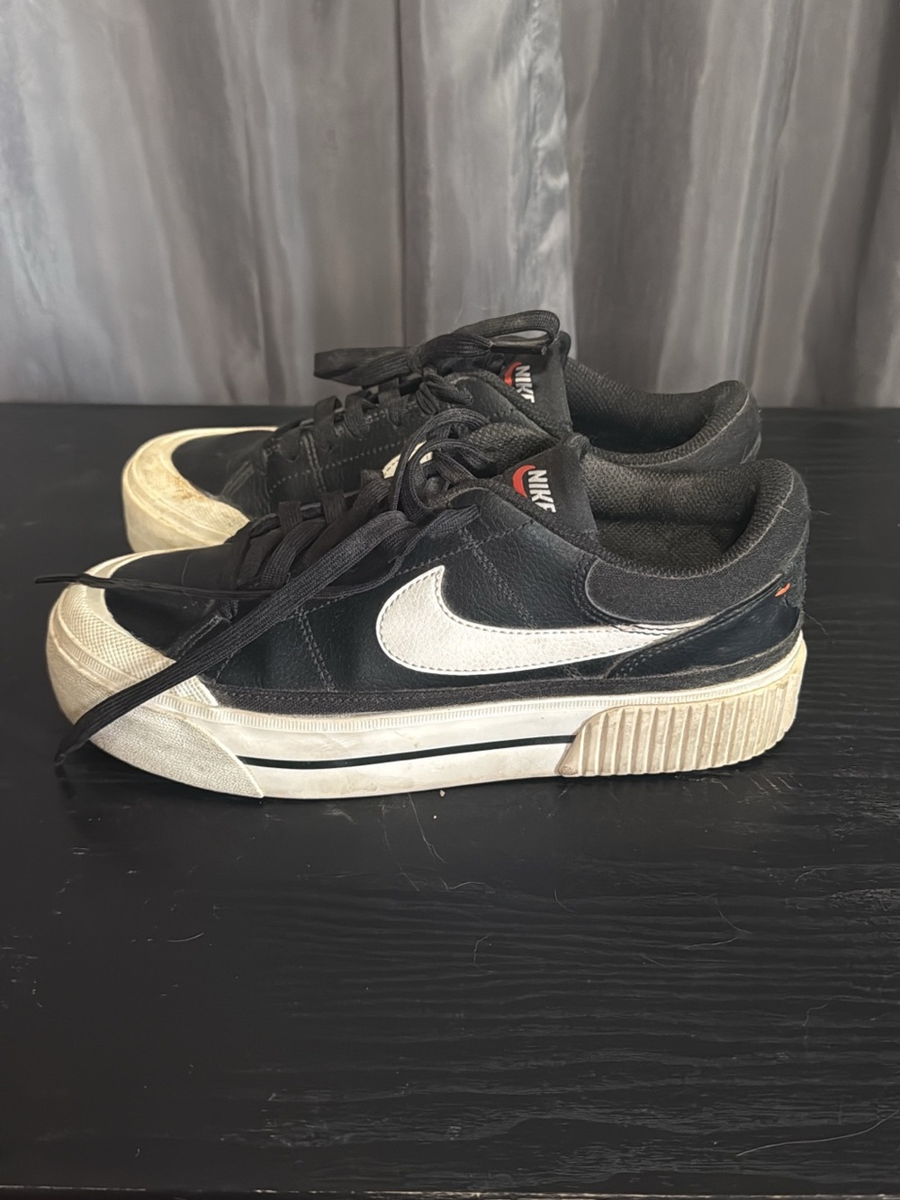 Nike Black Sneakers with White Swoosh